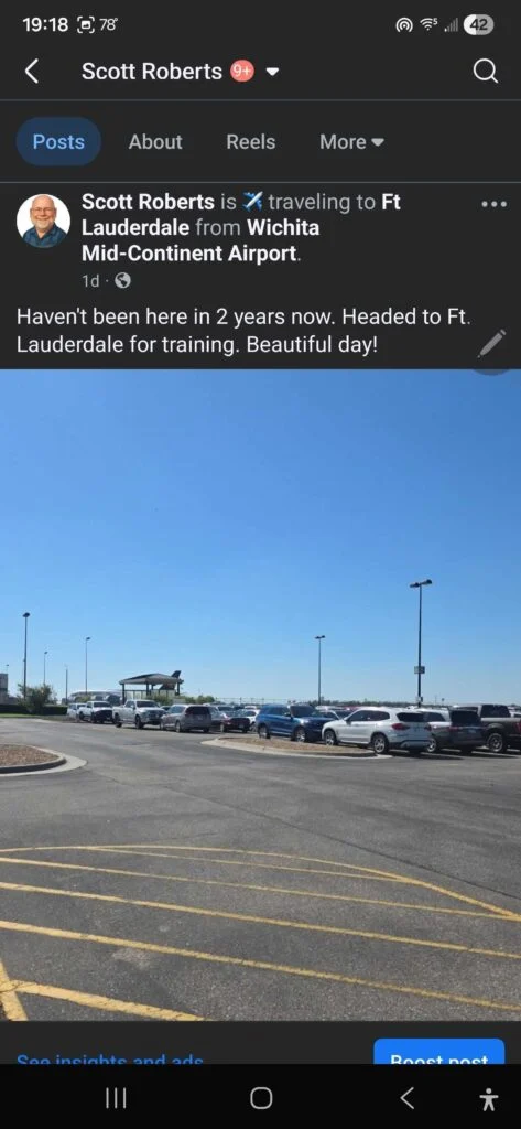 Parking lot at airport on a sunny day.